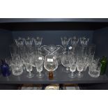 A selection of clear cut crystal glass wares including fruit bowl, brandy and wine glasses