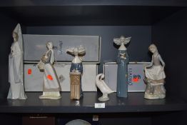 A good selection of Lladro figures and figurines including Rabbits food and Girl with cockerel