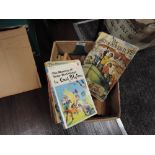 A box of paperback Enid Blyton volumes