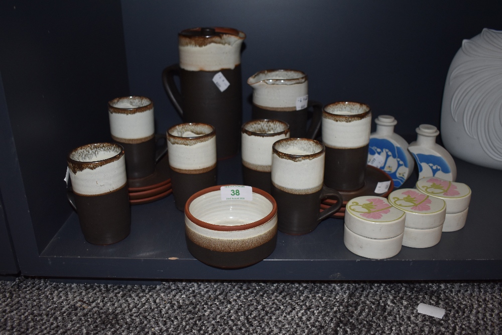 A coffee service by Newlyn pottery with salt glaze finish and similar ceramics