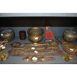 A variety of brass including plant pots of Indian design, door knocker, bells, weights and