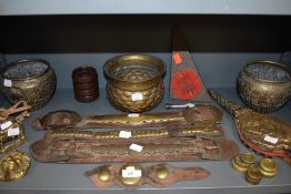 A variety of brass including plant pots of Indian design, door knocker, bells, weights and