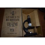 A vintage students microscope in box, J and L Randall LTD.