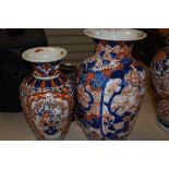 Two hard paste Chinese export vase in Imari palette both having floral decoration one having been