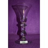 A wine goblet with a baluster stem angular knop and domed foot circa 1725 18cm slight blemish to