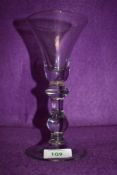 A wine goblet with a baluster stem angular knop and domed foot circa 1725 18cm slight blemish to
