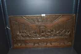 A Large Victorian plaque depicting Jesus Christ and the Last Supper cast in heavy metal possibly