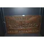 A Large Victorian plaque depicting Jesus Christ and the Last Supper cast in heavy metal possibly