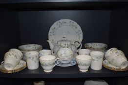 A selection of tea and coffee ceramics including cups saucers and teapot including Duchess and