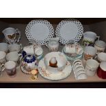 A varied lot of ceramics,a part tea service, souvenir items, tea pot,jugs,also items of royal