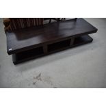 A modern dark stained TV stand or coffee table, approx. dimensions W160cm D52cm H32cm