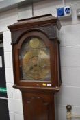 A late 18th Century oak cased long case clock having 8 day movement with 30cm brass face, recessed