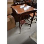 An early 20th Century mahogany hall table/splant stand, having shaped top and undetier, approx.
