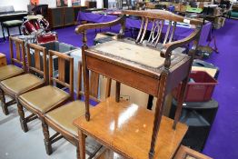 An Edwardian mahogany and inlaid piano stool, in need of refurbishment