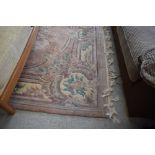 A large Chinese carpet square having pink ground , approx 300 x 214cm