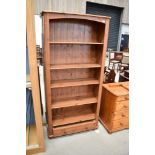 A modern pine bookshelf, approx. dimensions width 87cm height 180cm depth 30cm