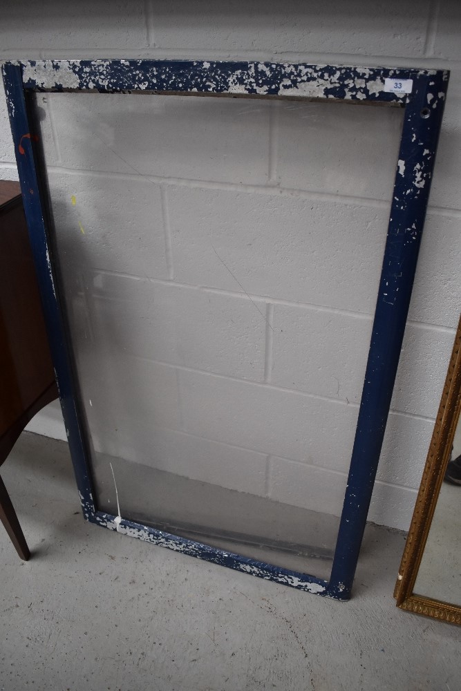 A metal window frame, approx. 109 x 71cm