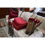 A selection of vintage metal framed and burgundy dralon upholstered cinema seats, believed to have