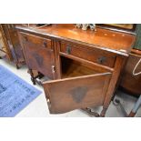 An early to mid 20th Century oak sideboard, width approx. 122cm