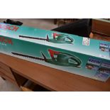 A Bosch AHS 48-16 hedge trimmer, boxed , looks to have had very little use