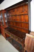 A period oak Yorkshire style dresser, with open base, three frieze drawers and plate rack, approx.