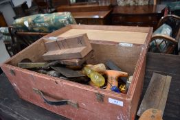 A vintage wooden tool box and contents