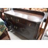 An early to mid 20th Century dark oak sideboard, approx. width 138cm