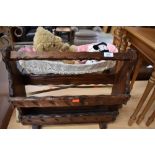 A rustic magazine rack and dolls rocking crib etc