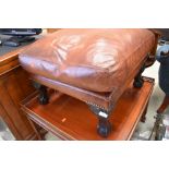 A modern leather square footstool on cabriole legs, approx. width 66cm