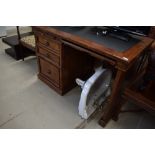 An Oriental hardwood style desk in the classical style, approx width 125cm depth 79cm