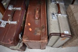 Three vintage travel cases