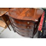 A reproduction mahogany serpentine chesy of four graduated drawers, approx width , 90cm at widest