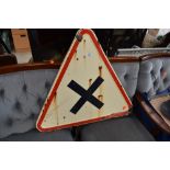 A vintage road or rail traingular warning sign, stamped on back, Jean Neuhaus s.a. 1972