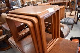 A vintage nest of three tables, of stylised modernist design