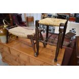 Two traditional rush seated stools including woolwinder style