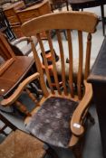 A traditional solid wood armchair