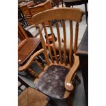 A traditional solid wood armchair