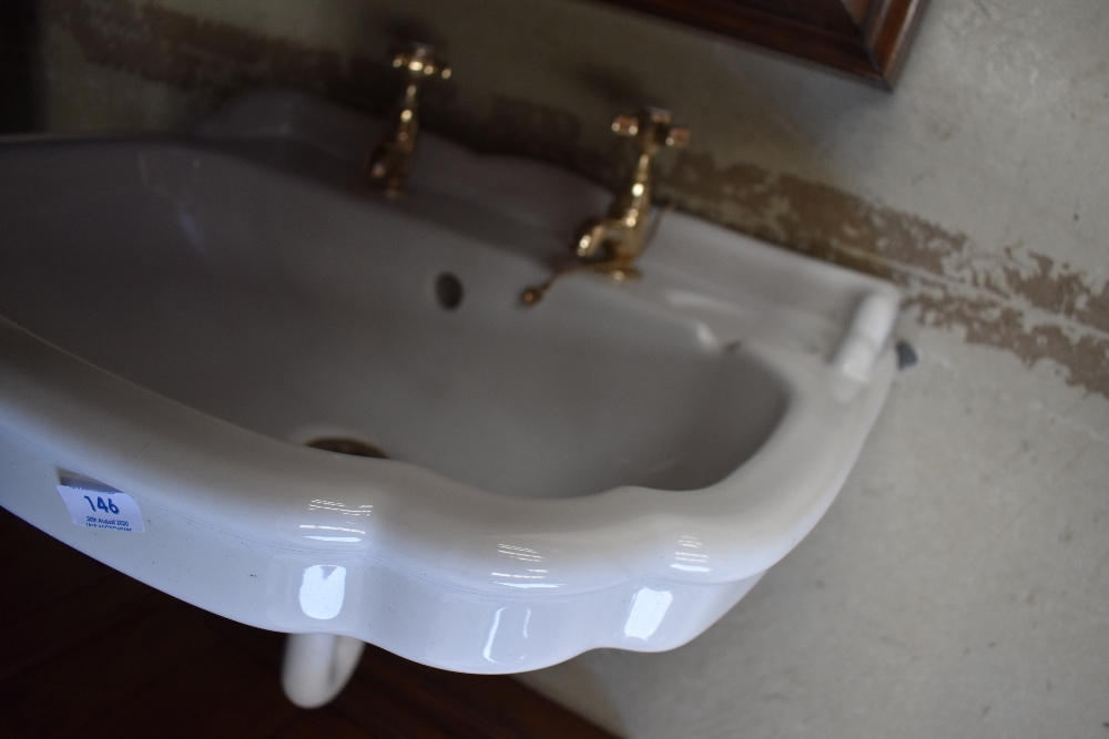 A pedestal wash basin in the traditional style