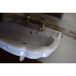 A pedestal wash basin in the traditional style