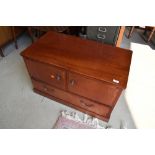 A modern mahogany TV cabinet