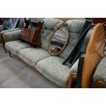 A late 20th Century Cintique three piece suite, comprising 3 seater settee and two armchairs,