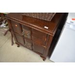 An unusual Oriental inspired mahogany chest of two deep drawers, probably early 20th Century with