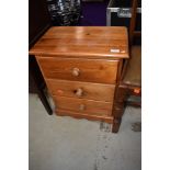 A modern pine bedside or similar chest of three drawers, approx. Width 48cm , height 59cm