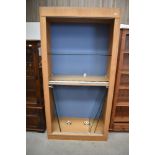 A modern beech display unit, suitable for a shop or a large private collection, glazed doors and