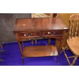 A reproduction mahogany hall table with two frieze drawers, approx. Width 67cm