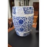 A reproduction oriental ceramic garden seat of barrel shape