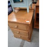 A pair of modern pine chests of three bedside drawers, width approx. 43cm