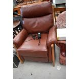 A modern leather and wood frame electric recliner chair