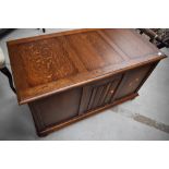 A mid 20th Century oak blanket box, having linen fold decoration to panel, approx. width 96cm