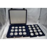 A collection of 24 Commonwealth silver coins, Aviation, Olympic, Naval etc in fitted case